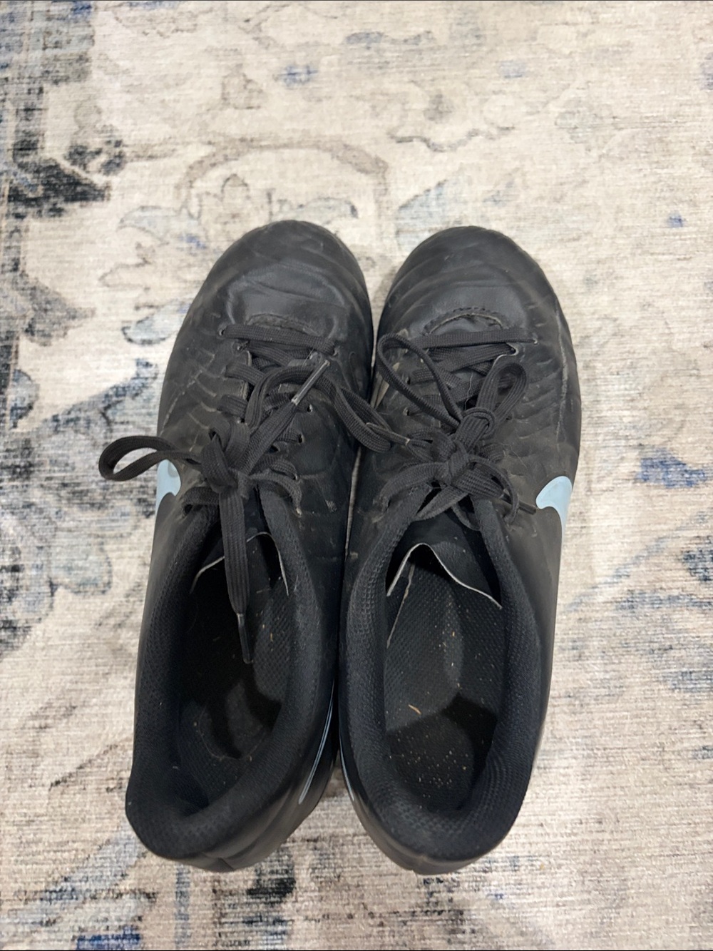 Nike Kids Black Athletic Shoes with Light Blue Swoosh